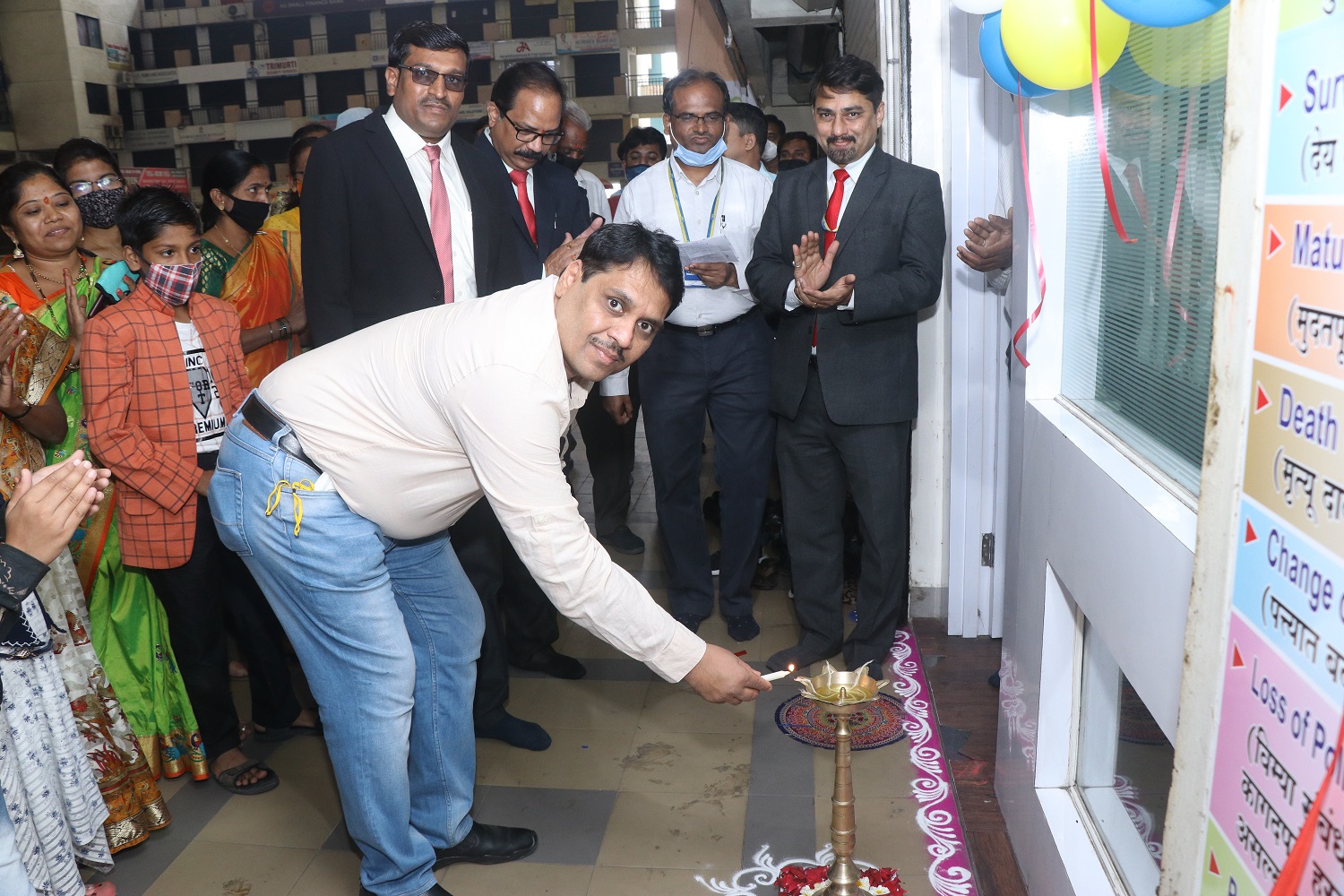 (OFFICE OPENNING) LIGHTING OF LAMP AT THE HANDS OF DR. VINOD GORE (ONCOLOGIST  AND CANCER SURGEON, PUNE